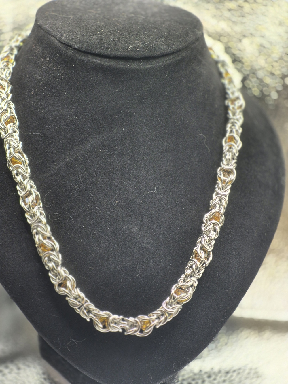 Champagne Colored Artisan Glass In An Interlocking Weave Chain Necklace
